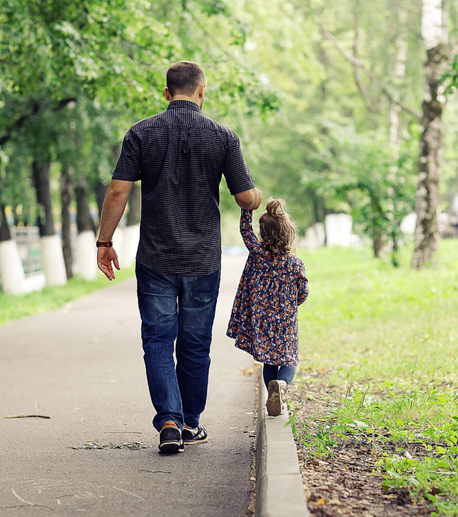 dad walking with daughter